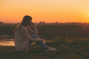 woman looking at the sunset needs heroin detox