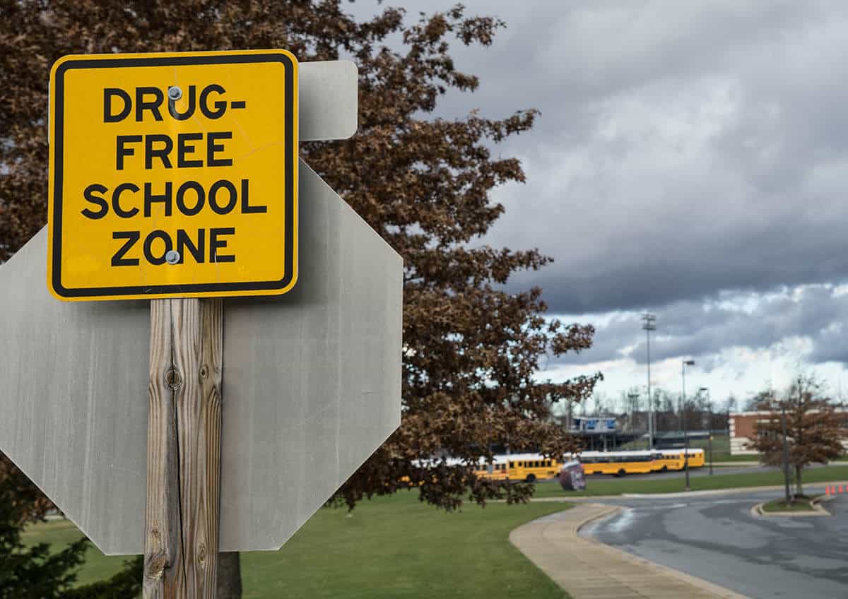 sign in a school zone is defending from the war on drugs