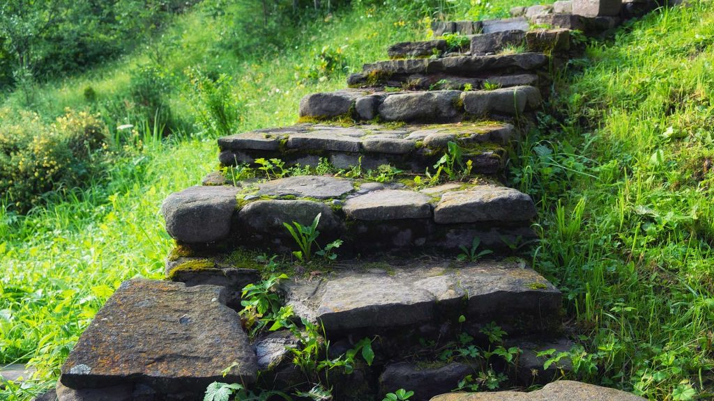 Stair of stones. Decorative element in the garden. Design and architecture. Stairs-image.