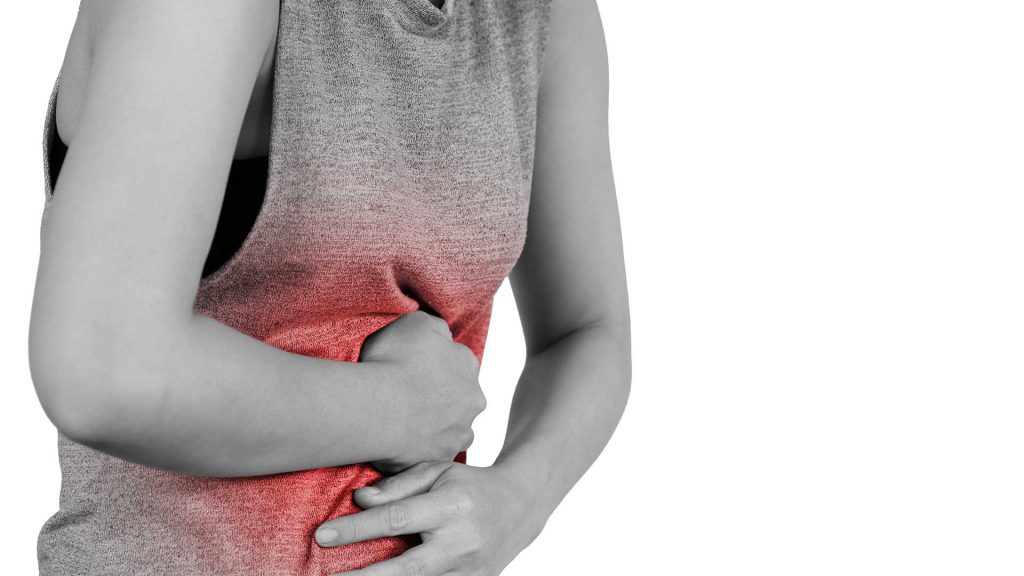 Inflammation colored in red suffering. stomach painful suffering from stomachache causes of menstruation period, gastric ulcer, appendicitis or gastrointestinal system disease. Healthcare and health insurance concept - isolated on white background with clipping path.