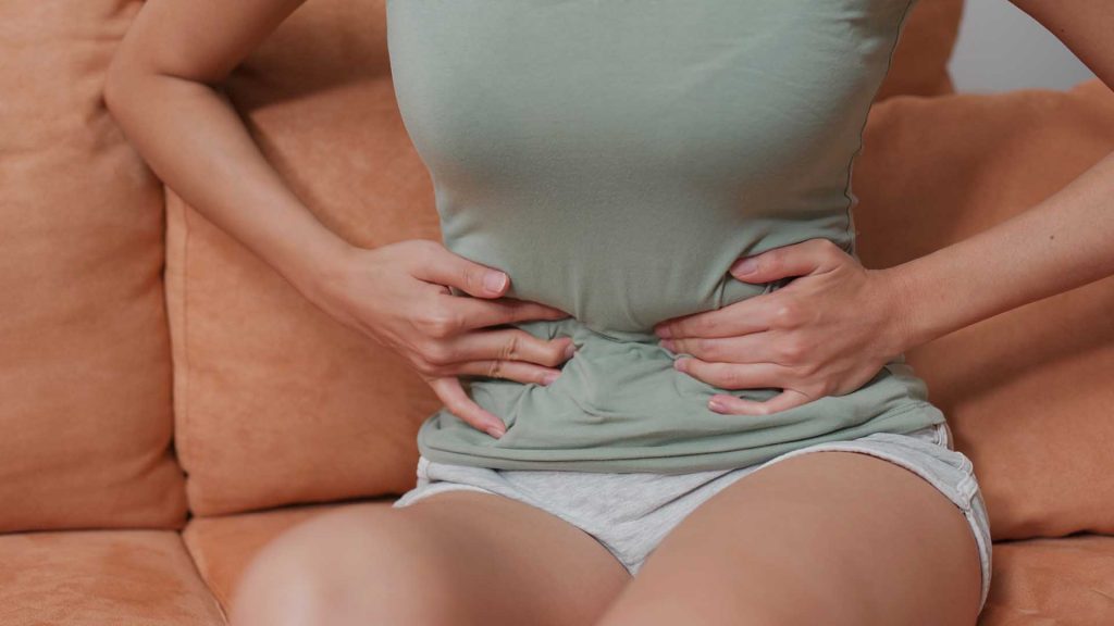 Woman suffer from stomach pain