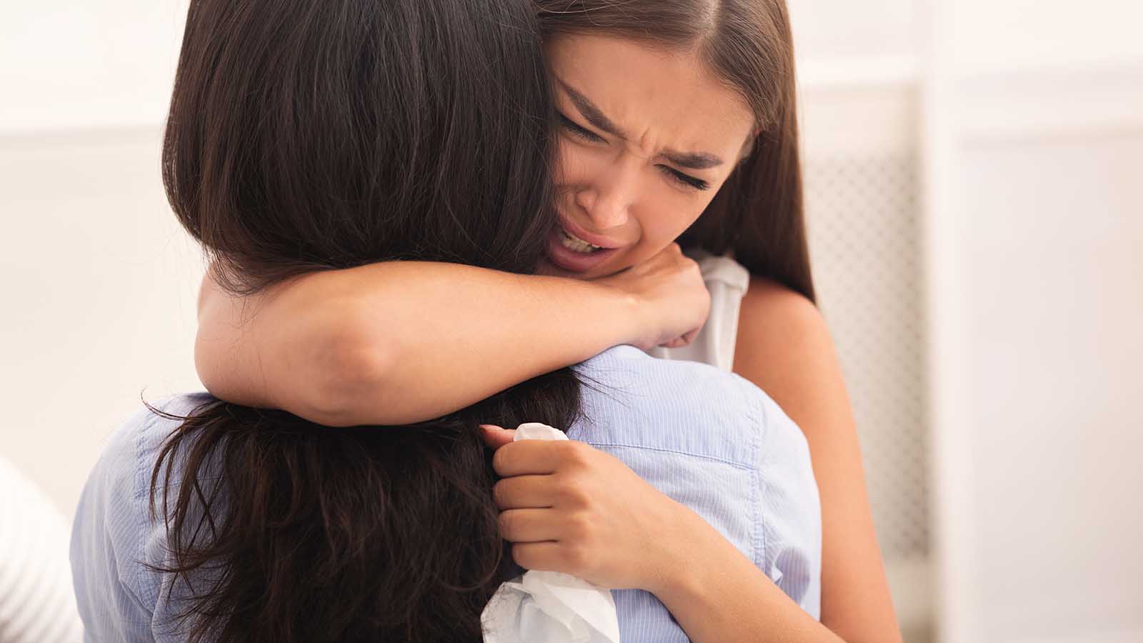 crying-girl-hugging