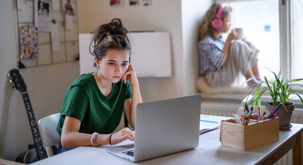 teenager-looking-on-computer