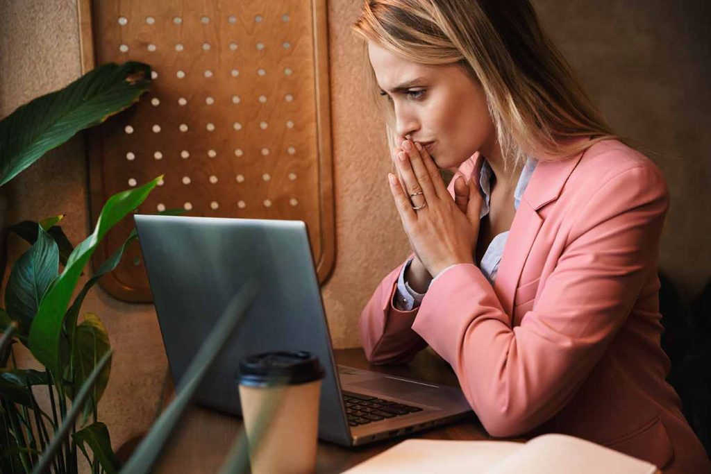 woman-worried-looking-on-computer