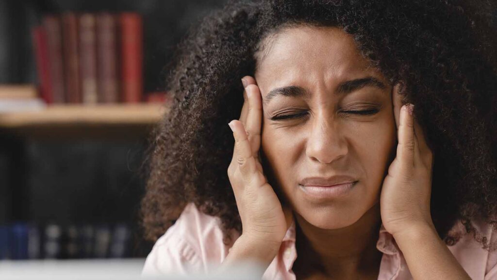 woman-struggling-with-headache-from-detox